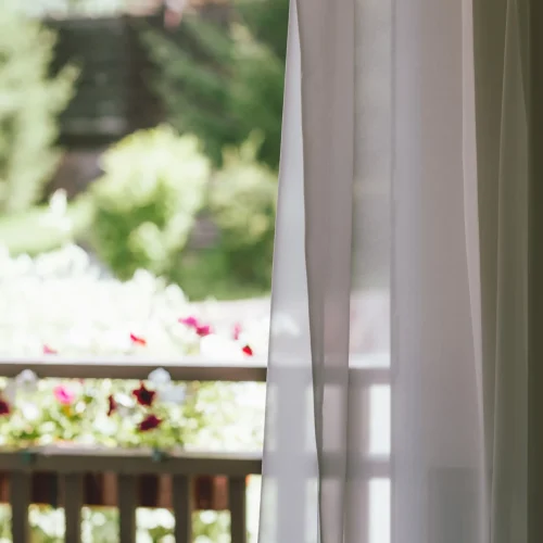 white-curtain-on-the-window-overlooking-the-backya-2026-01-05-05-26-18-utc white-curtain-on-the-window-overlooking-the-backya-2026-01-05-05-26-18-utc